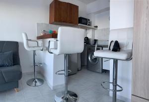 Appartements studio cosy avec vue panoramique : photos des chambres