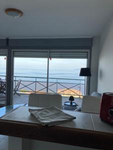 Appartements studio cosy avec vue panoramique : photos des chambres