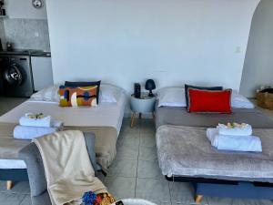 Appartements studio cosy avec vue panoramique : photos des chambres