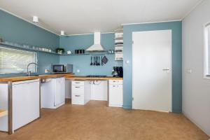 Havenrust 4-persoons aan het water Lauwersmeer, Friesland