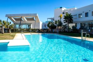 Casa Banderas garden level pool front apartment