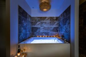 Appartements Suite balneo Bali Saint-Etienne : photos des chambres