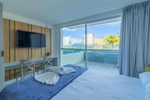 Ocean Blue #05 - Studio com piscina por Carpediem