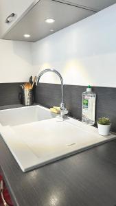 Appartements Luxueux T3 Balcon,10min Paris& cuisine equipee : photos des chambres