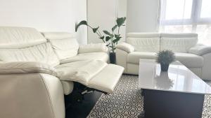 Appartements Luxueux T3 Balcon,10min Paris& cuisine equipee : photos des chambres