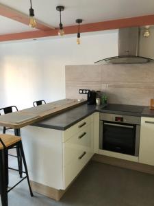 Appartements La Chrysalide : photos des chambres