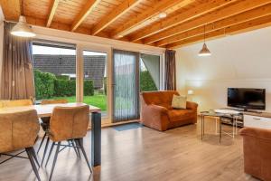 Boompieper I Beautiful family chalet with garden - 3hvězdičkové hotely ve městě Zwiggelte