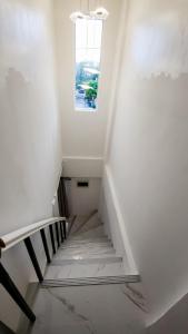 Ishas Place Self Check-In 2BR Netflix WiFi Camella Homes Villakananga