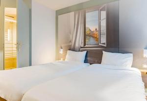 Hotels B&B HOTEL Chatellerault : photos des chambres