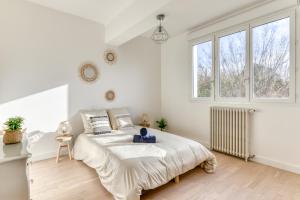 Villas Big House - Parking Privee - Piscine - Wifi - tout equipee : photos des chambres