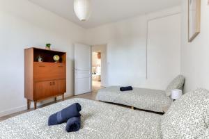 Villas Big House - Parking Privee - Piscine - Wifi - tout equipee : photos des chambres