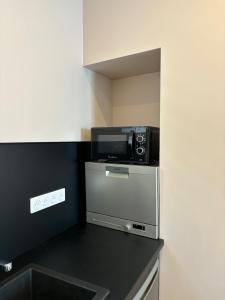 Appartements Studio centre ville La Bourboule : photos des chambres
