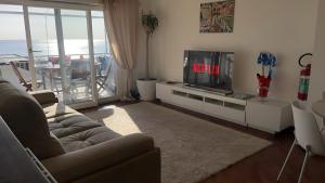 Attico con terrazza fronte mare a Cavi di Lavagna