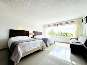 Amplio Condo con acceso a playa - 6 Px