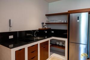 NHOA 203B Lux 1BR Condo Pool View in Aldea Zama