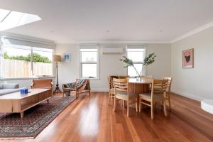 Charming 3-Bedroom Home with Sunroom & Parking