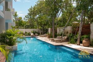 NHOA 205B Lux 1BR Condo Pool View in Aldea Zama