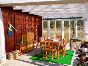 Serene Lakehouse with Rowing Boat