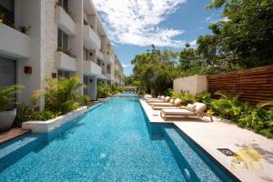 NHOA 303B Lux 1BR Condo Pool View in Aldea Zama
