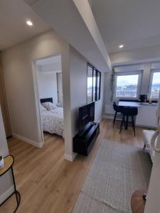 Appartements Sur la savoureuse - Le 64 : photos des chambres