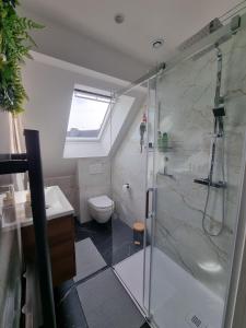 Appartements Sur la savoureuse - Le 64 : photos des chambres