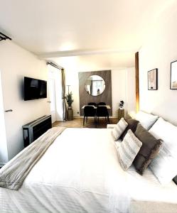 Appartements Studio neuf climatise - Triangle d-Or : photos des chambres