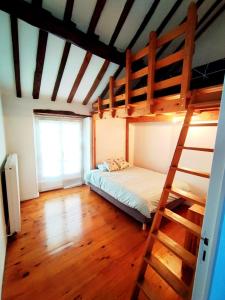 Maisons de vacances maison chaleureuse avec jardin : photos des chambres