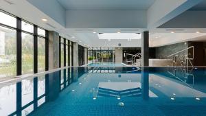 VacationClub - Green Port Apartament 213