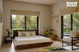 Reflection House by StayVista with Pool, Terrace bar, Indoor games & Exquisite interiors in a nutshell