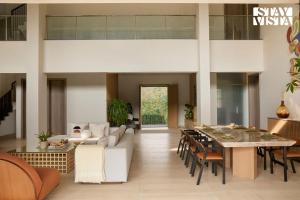 Reflection House by StayVista with Pool, Terrace bar, Indoor games & Exquisite interiors in a nutshell