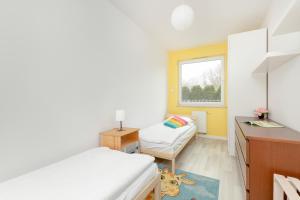 Pastel & Cozy Apartment with a Spacious Terrace in Gdańsk by Noclegi Renters