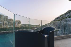 Waters Edge Suite Xlendi Direct Seafront with Private Roof Top Jacuzzi
