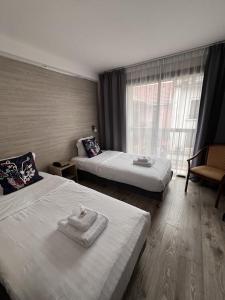 Hotels Au Bec Fin Hotel : Chambre Lits Jumeaux avec Douche 