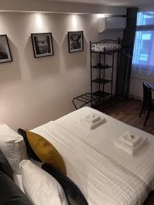 Hotels Au Bec Fin Hotel : photos des chambres