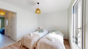 Maisons de vacances Merlyne Beach Villa 7 : photos des chambres