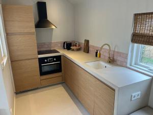 Fijn strandhuis dicht aan zee!