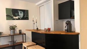 Appartements L-ideal Central - Gare - RDC : photos des chambres