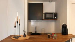 Appartements L-ideal Central - Gare - RDC : photos des chambres