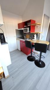 Appartements joli petit T2 proche gare et centre : photos des chambres