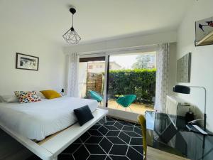 Appartements le Nid des Cedres, voisin des Thermes et du centre : photos des chambres