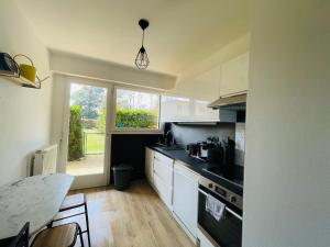 Appartements le Nid des Cedres, voisin des Thermes et du centre : photos des chambres
