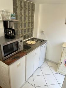 Appartements Gite de la Riviere Enchantee : photos des chambres