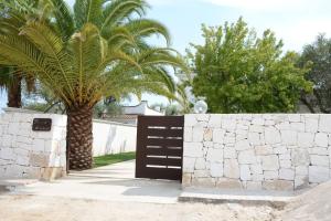 Villa Maria con Piscina nel Boomerang Village a Torre Colimena