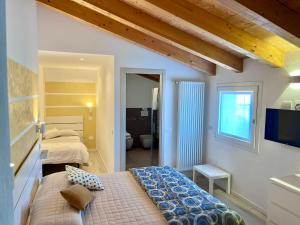 Habitación Doble Deluxe (2 adultos + 1 niño)