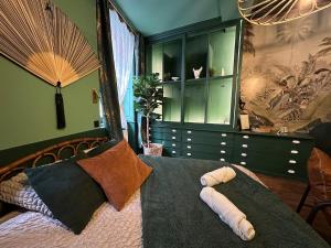 Appartements LE JUNGLE-ROOM, Sauna, Hyper-centre : photos des chambres