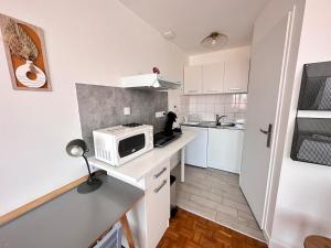 Appartements La suite des 3 piliers studio avec parking prive : photos des chambres