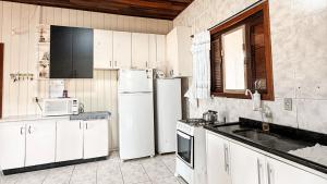 Casa aconchegante com piscina e churrasqueira