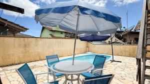 Casa aconchegante com piscina e churrasqueira