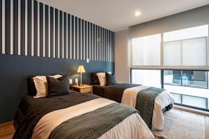 Stylish Urban Retreat with Balcony and Coworking Space