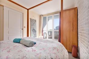 Appartements Appartement avec balcon proche Paris & transports : photos des chambres